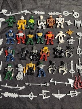 LEGO 21 Bionicle Minifigures Extra Body Parts Weapons Minifig Lot McDonald's